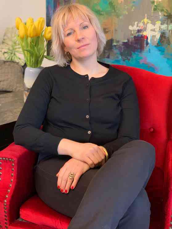 Portrait of Anna in a red armchair