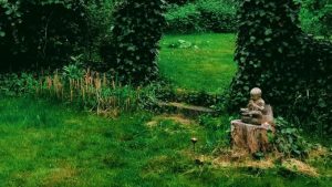Little buddha overlooking garden