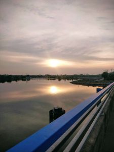 Double sun over the water